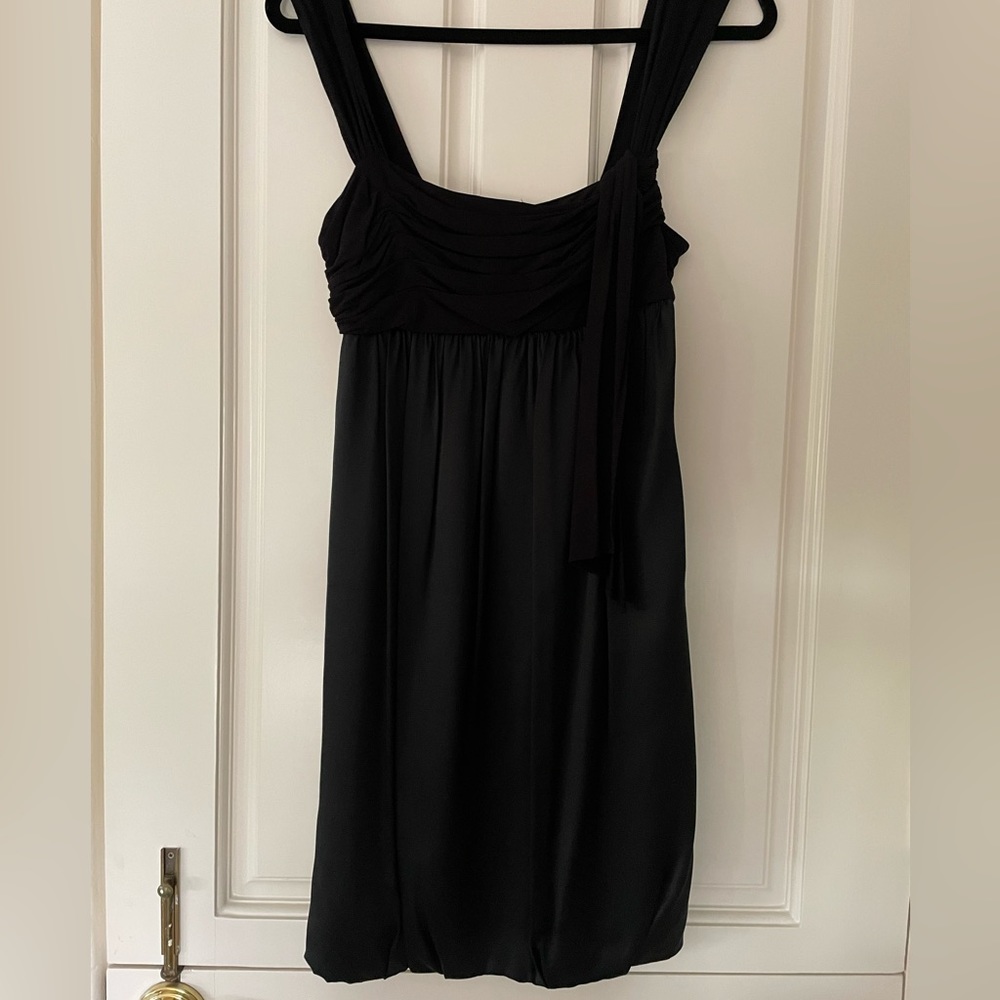 BCBG satiny black dress size small 33 inch length. Perfect for the holidays!